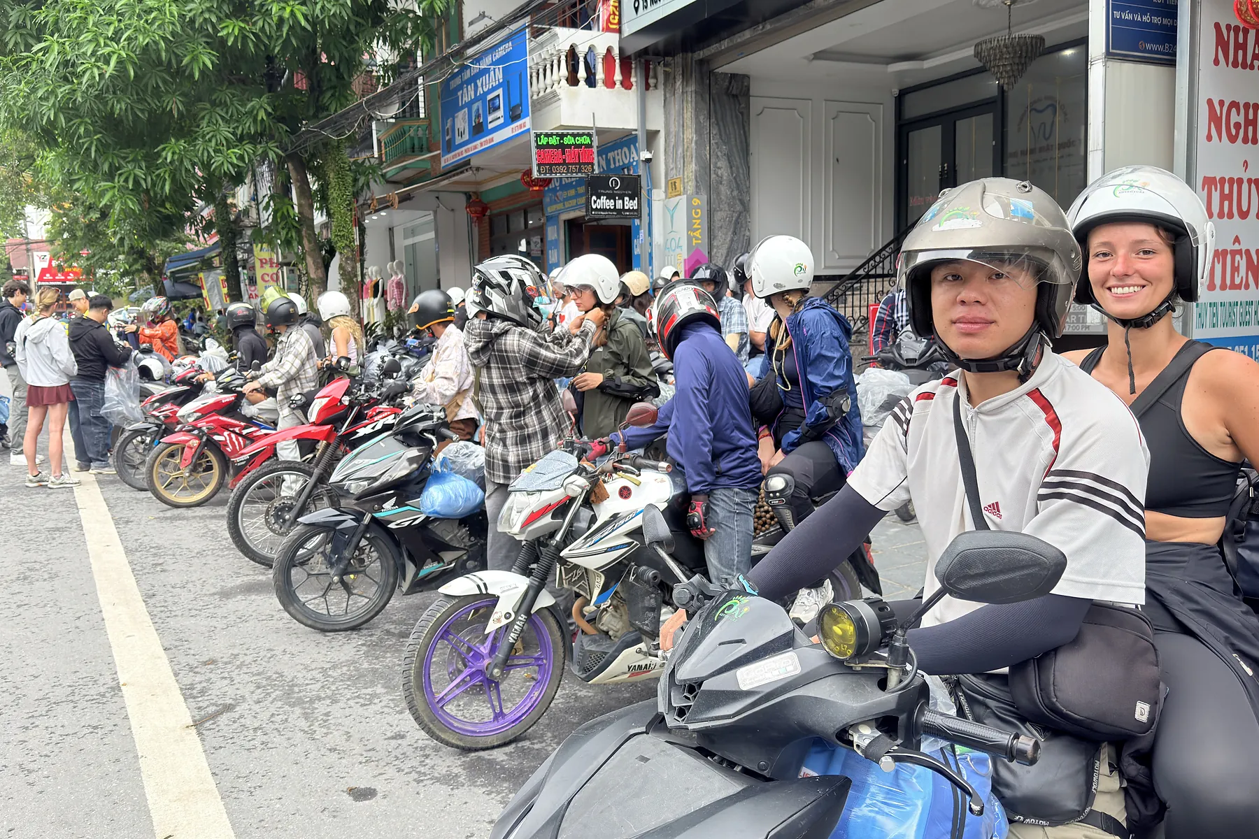 Travellers preparing motorbikes before a Ha Giang journey