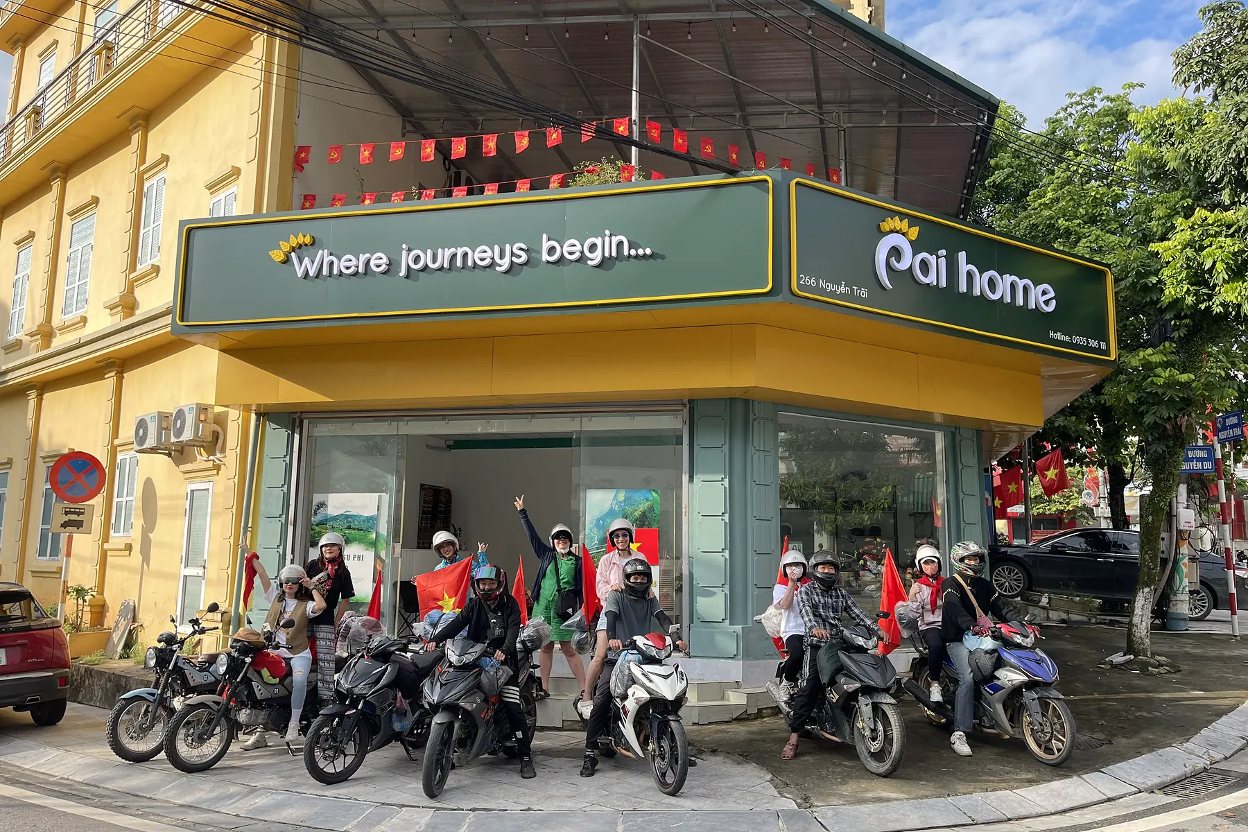 Small group preparing motorbikes for a Ha Giang National Day departure
